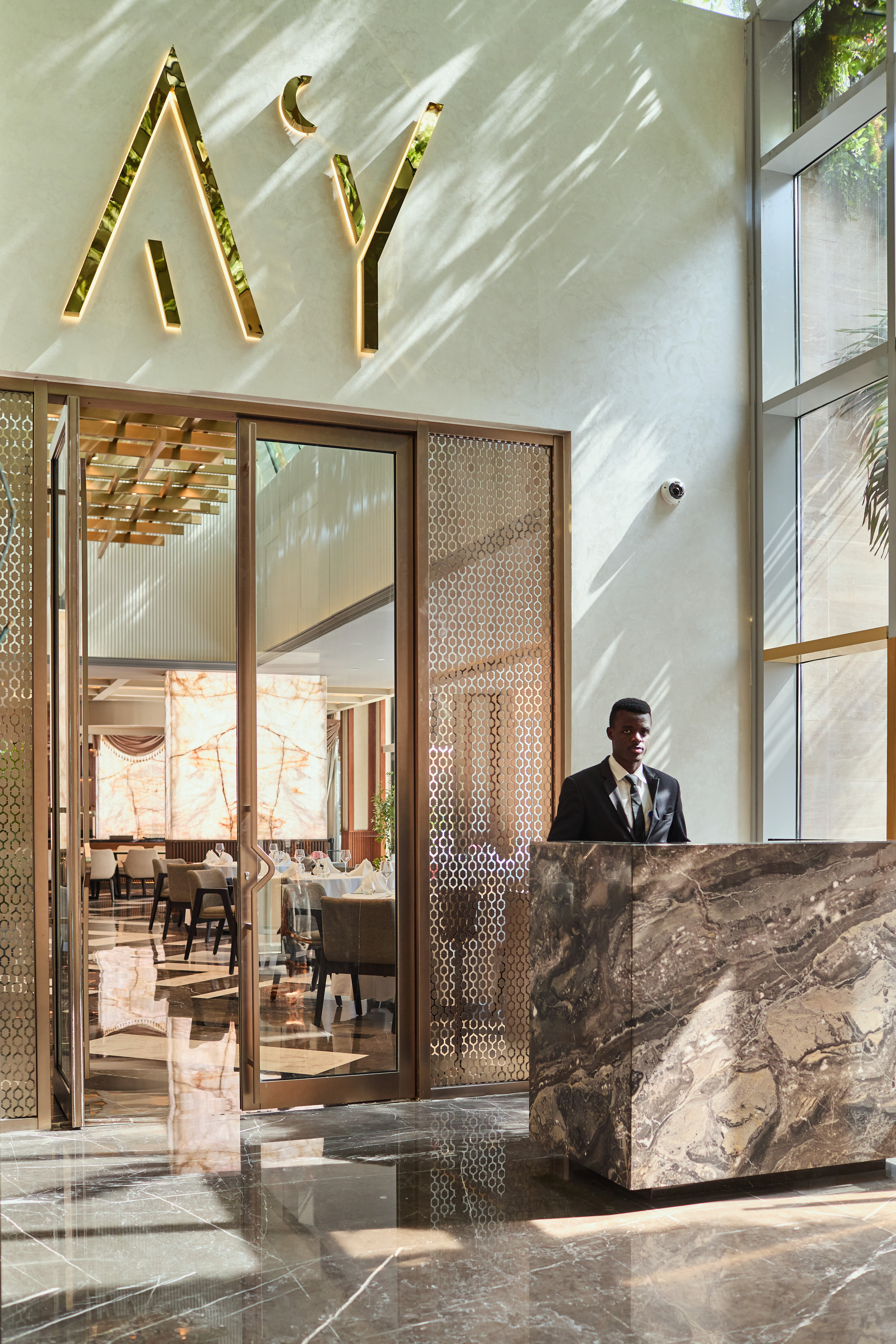 AY Restaurant, Sunlit and casual by day, relaxed and social by night.